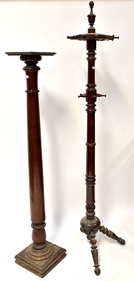 Lot 43 - A mahogany tapering pillar to square section...