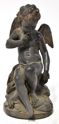 Lot 338 - A bronze figure of a seated cherub, unmarked,...