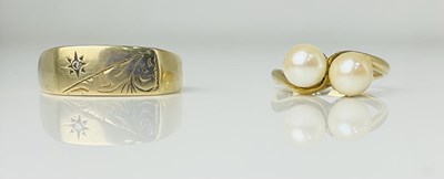 Lot 743 - Two 9ct yellow gold rings, one with misshaped...
