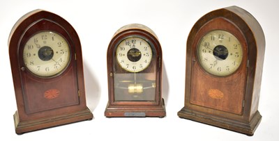 Lot 119 - BULLE; two inlaid lancet-shaped mantel clocks,...