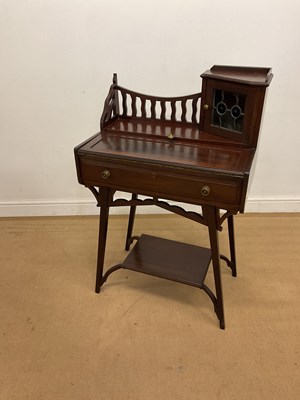 Lot 898 - A mahogany Arts and Crafts lady's writing desk,...