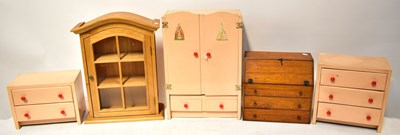 Lot 618 - A doll's pink painted wooden bedroom suite,...