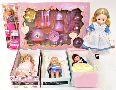 Lot 499 - A collection of modern dolls, to include a...