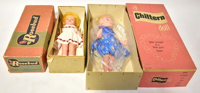 Lot 564 - Two boxed vintage vinyl dolls, comprising a...