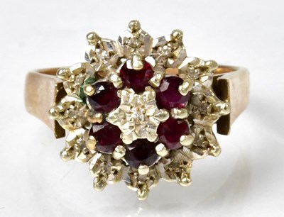 Lot 1163 - A 9ct gold gem set cluster ring, illusion set,...