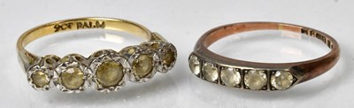 Lot 1186 - A 9ct yellow gold and spinel set five-stone...