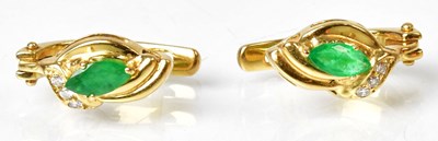Lot 1313 - A pair of yellow metal diamond and emerald set...