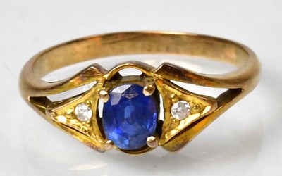Lot 1181 - A yellow metal sapphire and diamond ring, with...