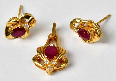 Lot 1275 - A yellow metal pendant and pair of earrings,...