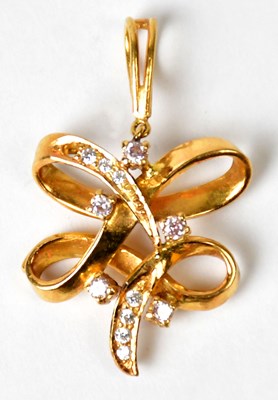 Lot 1269 - A yellow metal pendant, modelled as an...