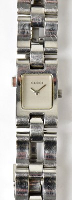 Lot 1394 - GUCCI; a ladies' stainless steel wristwatch,...
