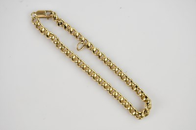 Lot 1209 - A yellow metal flat link bracelet, stamped...