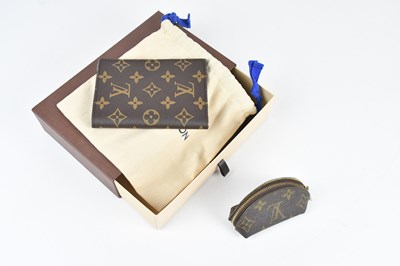 Lot 69 - LOUIS VUITTON; a brown and tan monogram coated...