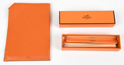 Lot 792 - HERMES; a box of twelve branded nail files,...