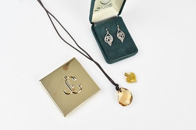 Lot 319 - SWAROVSKI; a light amber coloured crystal...