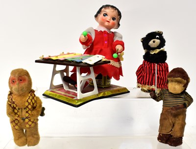 Lot 730 - Three early to mid 20th century mechanical...