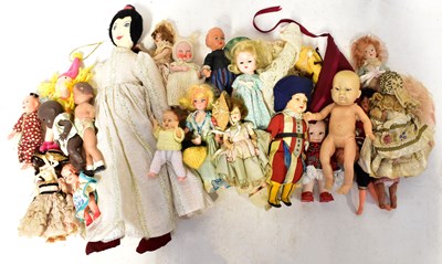 Lot 525 - A quantity of small dolls, including many...
