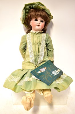 Lot 560 - SIMON & HALBIG; a bisque headed doll, with...