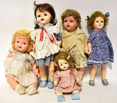 Lot 548 - Five mid-20th century dolls, including plastic...
