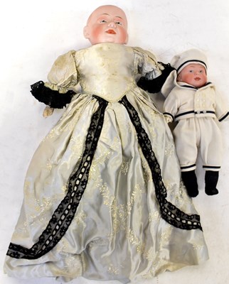 Lot 569 - Two Gebruder Knoch bisque headed dolls,...