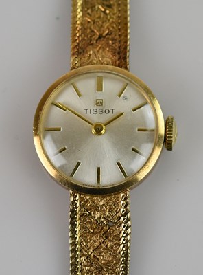 Lot 488 - TISSOT; a lady's 9ct gold cased wristwatch,...