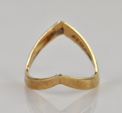 Lot 2552 - A 9ct yellow gold wishbone ring, size P,...
