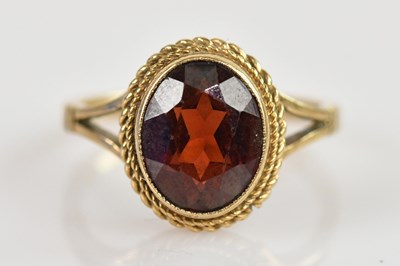 Lot 2591 - A late Victorian 9ct gold garnet set dress...