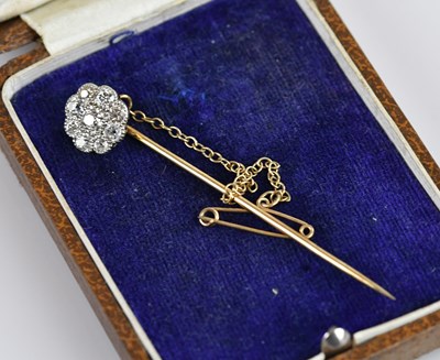 Lot 1459 - A Victorian yellow metal diamond set cluster...