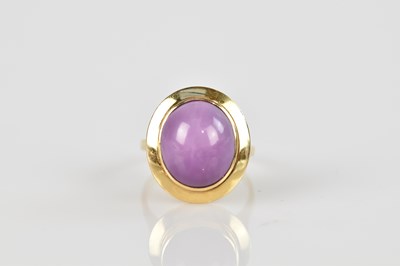 Lot 2317 - A yellow metal mounted star ruby dress ring,...