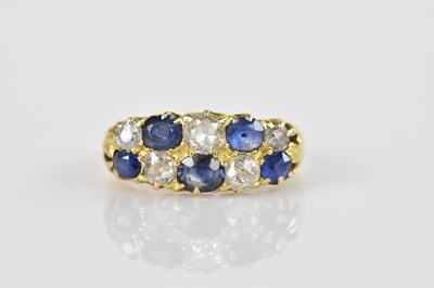 Lot 2300 - A yellow metal diamond and sapphire ten stone...