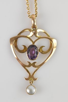 Lot 2200 - An Edwardian amethyst and pearl pendant,...
