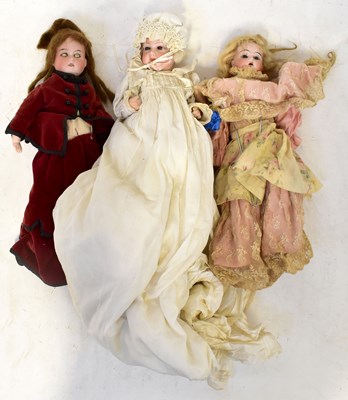 Lot 565 - Three German bisque headed dolls with hand...
