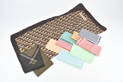 Lot 97 - CHRISTIAN DIOR; a 100% silk long scarf with...