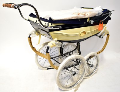Lot 641 - A Silver Cross Millennium coach built pram in...