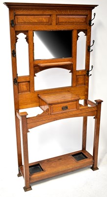 Lot 44 - An Edwardian oak hall stand with central...