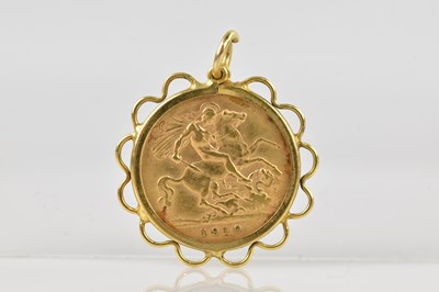 Lot 2114 - An Edward VII half sovereign, 1910, set in a...