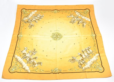 Lot 71 - HERMÈS, a 100% twill silk golden yellow, cream...