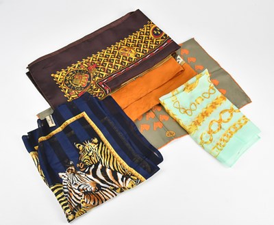 Lot 116 - FENDI; a sage green 100% silk scarf,...