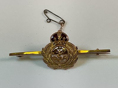 Lot 697 - A 9ct gold and enamelled Royal Navy Reserve...