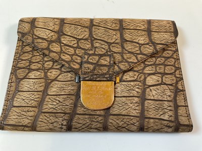 Lot 732 - A leather wallet with 9ct gold clasp,...
