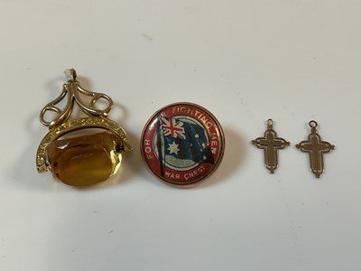 Lot 795 - A Victorian swivel fob in yellow metal...