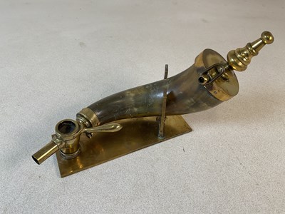 Lot 137 - A brass mounted powder horn, fitted with brass...