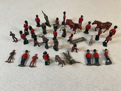 Lot 274 - A group of lead soldiers, with some farm...