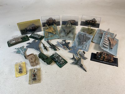 Lot 279 - A group of diecast military equipment and planes.