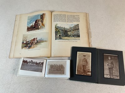 Lot 34 - Three albums containing WWI and WWII military...