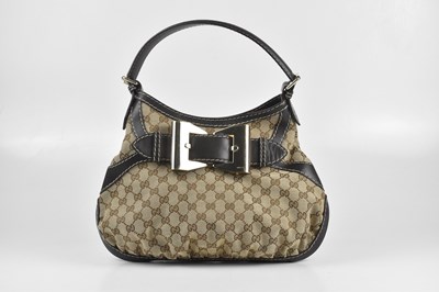 Lot 150 - GUCCI; a GG canvas Queen Hobo bag, with...