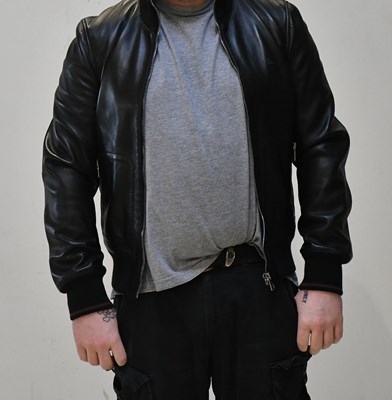 Lot 156 - GUCCI; a black soft calfskin leather bomber...