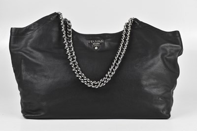 Lot 152 - PRADA; a black calfskin leather chain handbag,...