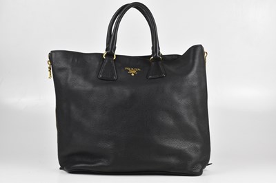Lot 153 - PRADA; a black pebbled calfskin leather...