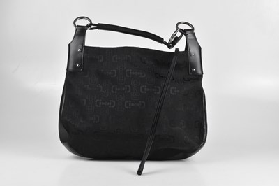 Lot 157 - GUCCI; a black soft leather and cloth Horsebit...